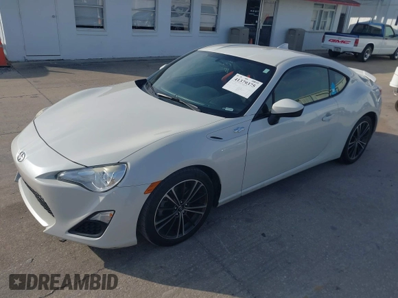✅ 2015 Scion FR-S • VIN: JF1ZNAA12F8711835 • Lot: 41379375. Listed on IAAI with 137,029 mi. Free auction sales archive from the USA and detailed vehicle history report at DreamBid. Image 2.