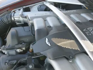 ✅ 2005 Aston Martin DB9 • VIN: SCFAD01A75GA01262 • Lot: 41937486. Wystawiony na IAAI z przebiegiem 35 538 mil. Bezpłatny archiwum sprzedaży aukcyjnych z USA i szczegółowy raport historii pojazdu na DreamBid. Zdjęcie 18.