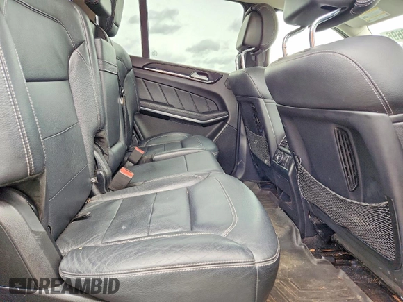 ✅ 2016 Mercedes-Benz GL 550 • VIN: 4JGDF7DE8GA658549 • Лот: 53940696. Опубліковано раніше на Copart з пробігом 176 520 миль. Безкоштовний доступ до архіву аукціонних продажів зі США та докладний звіт про історію автомобіля на DreamBid. Зображення 11.
