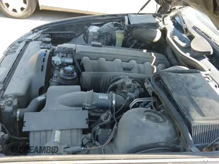 ✅ 1997 BMW 5 Series 528i • VIN: WBADD6325VBW03265 • Lot: 43319599. Listed on IAAI with 164,016 mi. Free auction sales archive from the USA and detailed vehicle history report at DreamBid. Image 14.