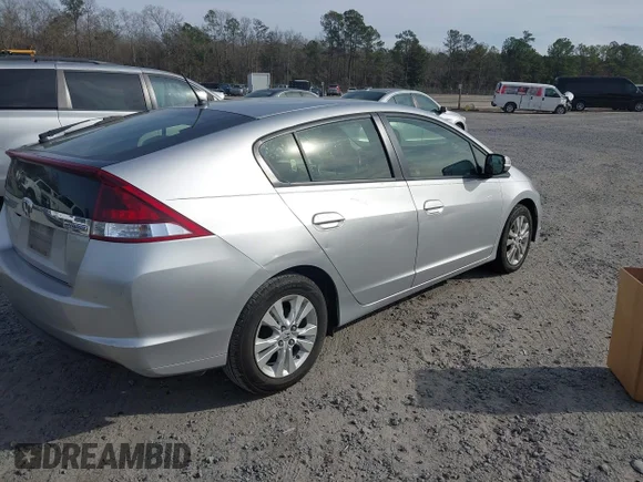 ✅ 2013 Honda Insight EX • VIN: JHMZE2H77DS003878 • Лот: 44143285. Опубліковано раніше на IAAI з пробігом 186 652 миль. Безкоштовний доступ до архіву аукціонних продажів зі США та докладний звіт про історію автомобіля на DreamBid. Зображення 4.