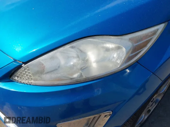 ✅ 2012 Ford Fiesta SES • VIN: 3FADP4FJXCM102174 • Lot: 44903589. Wystawiony na IAAI z przebiegiem 105 630 mil. Bezpłatny archiwum sprzedaży aukcyjnych z USA i szczegółowy raport historii pojazdu na DreamBid. Zdjęcie 6.