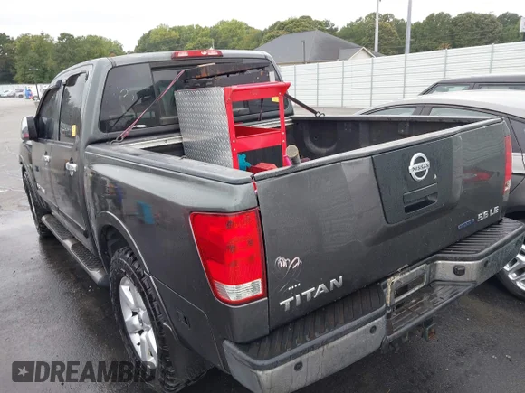 ✅ 2009 Nissan Titan SE • VIN: 1N6BA07D59N317090 • Lot: 43367465. Wystawiony na IAAI z przebiegiem 167 406 mil. Bezpłatny archiwum sprzedaży aukcyjnych z USA i szczegółowy raport historii pojazdu na DreamBid. Zdjęcie 3.