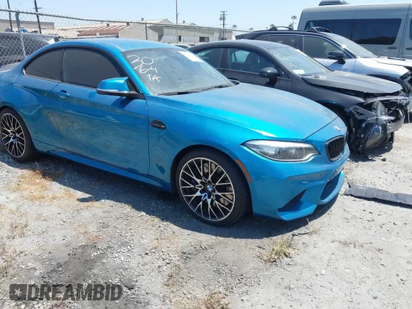 ✅ 2018 BMW M2 • VIN: WBS1J5C59JVE51997 • Lot: 42348421. Wystawiony na IAAI z przebiegiem 51 376 mil. Bezpłatny archiwum sprzedaży aukcyjnych z USA i szczegółowy raport historii pojazdu na DreamBid. Zdjęcie 1.