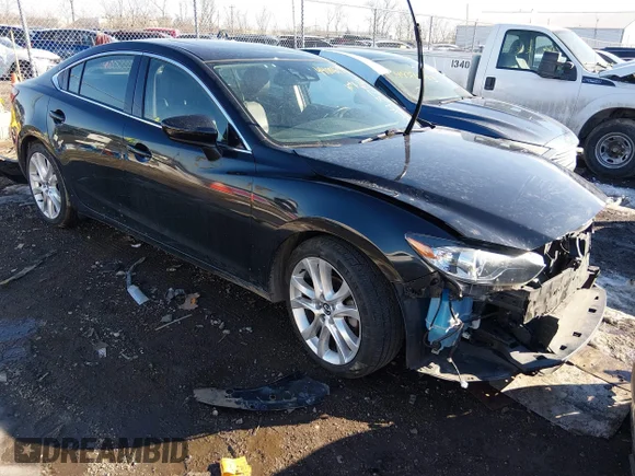 ✅ 2014 Mazda 6 i Grand Touring • VIN: JM1GJ1W69E1149229 • Lot: 44379165. Listed on IAAI with 76,984 mi. Free auction sales archive from the USA and detailed vehicle history report at DreamBid. Image 1.