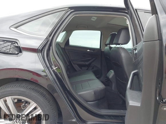 ✅ 2023 Volkswagen Jetta SE • VIN: 3VW7M7BU3PM007797 • Lot: 44398602. Wystawiony na IAAI z przebiegiem 51 862 mil. Bezpłatny archiwum sprzedaży aukcyjnych z USA i szczegółowy raport historii pojazdu na DreamBid. Zdjęcie 8.