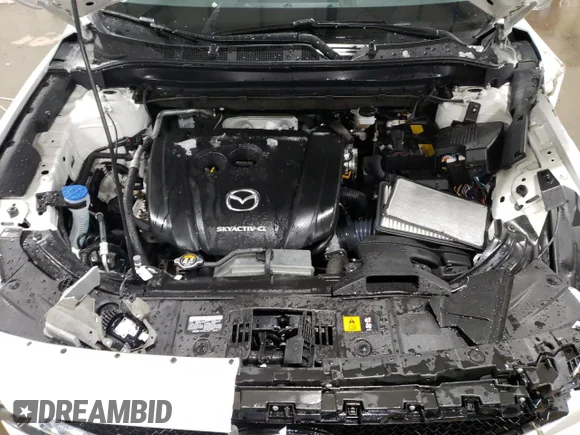 ✅ 2020 Mazda CX-5 Grand Touring • VIN: JM3KFBDM4L0780743 • Lot: 38180933. Wystawiony na Copart z przebiegiem 27 469 mil. Bezpłatny archiwum sprzedaży aukcyjnych z USA i szczegółowy raport historii pojazdu na DreamBid. Zdjęcie 12.