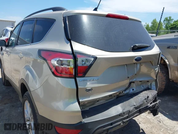 ✅ 2018 Ford Escape SEL • VIN: 1FMCU0HD1JUA08607 • Лот: 45100892. Опубликован ранее на IAAI с пробегом 76 649 миль. Бесплатный доступ к архиву аукционных продаж из США и подробный отчёт об истории автомобиля на DreamBid. Изображение 6.
