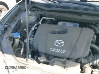 ✅ 2015 Mazda CX-5 Grand Touring • VIN: JM3KE2DY0F0510869 • Lot: 42510575. Wystawiony na IAAI z przebiegiem 134 527 mil. Bezpłatny archiwum sprzedaży aukcyjnych z USA i szczegółowy raport historii pojazdu na DreamBid. Zdjęcie 21.