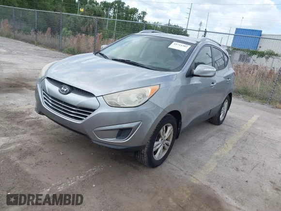 ✅ 2012 Hyundai Tucson GLS • VIN: KM8JU3AC5CU525115 • Lot: 44711382. Listed on IAAI with 165,499 mi. Free auction sales archive from the USA and detailed vehicle history report at DreamBid. Image 2.