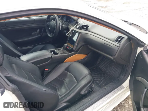 ✅ 2012 Maserati GranTurismo S • VIN: ZAM45KLA3C0062348 • Lot: 42284460. Listed on IAAI with 73,731 mi. Free auction sales archive from the USA and detailed vehicle history report at DreamBid. Image 5.