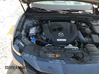 ✅ 2023 Mazda CX-50 Premium Plus • VIN: 7MMVABEY4PN100449 • Лот: 81348755. Опубликован ранее на Copart с пробегом 24 919 миль. Бесплатный доступ к архиву аукционных продаж из США и подробный отчёт об истории автомобиля на DreamBid. Изображение 17.