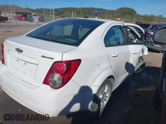 ✅ 2012 Chevrolet Sonic LS • VIN: 1G1JA5SH9C4207543 • Lot: 43339055. Listed on IAAI with 128,915 mi. Free auction sales archive from the USA and detailed vehicle history report at DreamBid. Image 4.