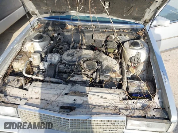 ✅ 1988 Cadillac Fleetwood • VIN: 1G6CB5157J4271469 • Lot: 42487701. Wystawiony na IAAI z przebiegiem Nie podano. Bezpłatny archiwum sprzedaży aukcyjnych z USA i szczegółowy raport historii pojazdu na DreamBid. Zdjęcie 10.