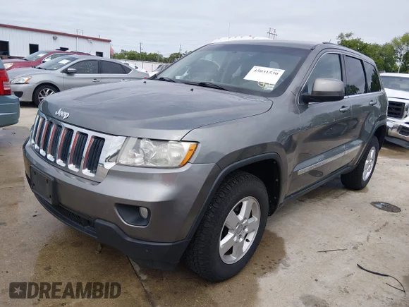 ✅ 2013 Jeep Grand Cherokee Laredo • VIN: 1C4RJFAG3DC518708 • Lot: 45031530. Listed on IAAI with 202,875 mi. Free auction sales archive from the USA and detailed vehicle history report at DreamBid. Image 2.
