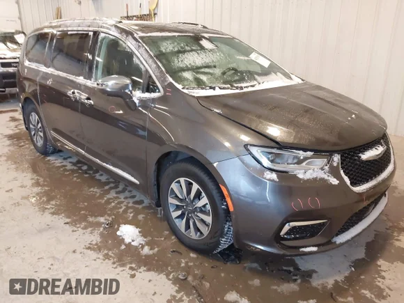 ✅ 2021 Chrysler Pacifica Hybrid Limited • VIN: 2C4RC1S70MR590338 • Лот: 44255158. Опубликован ранее на IAAI с пробегом 47 922 миль. Бесплатный доступ к архиву аукционных продаж из США и подробный отчёт об истории автомобиля на DreamBid. Изображение 1.