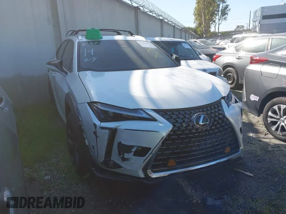 ✅ 2025 Lexus UX 300h Premium • VIN: JTHYBJAH0S2002876 • Лот: 44068758. Опубліковано раніше на IAAI з пробігом 23 492 миль. Безкоштовний доступ до архіву аукціонних продажів зі США та докладний звіт про історію автомобіля на DreamBid. Зображення 1.