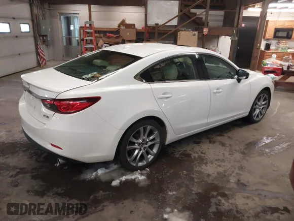 ✅ 2014 Mazda 6 i Grand Touring • VIN: JM1GJ1W66E1131898 • Лот: 41607839. Опубликован ранее на IAAI с пробегом 125 294 миль. Бесплатный доступ к архиву аукционных продаж из США и подробный отчёт об истории автомобиля на DreamBid. Изображение 4.