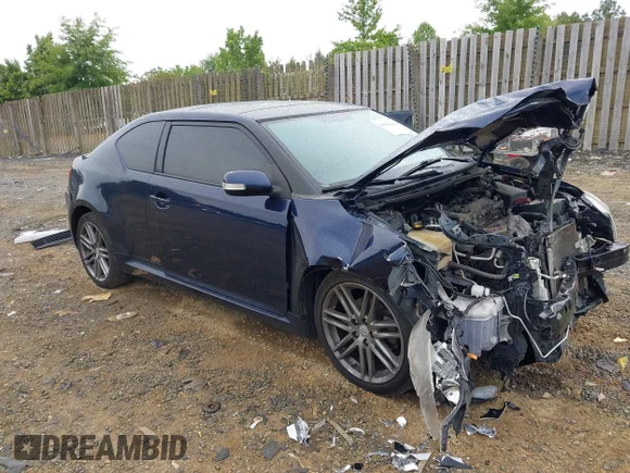 ✅ 2012 Scion tC • VIN: JTKJF5C70C3038350 • Lot: 45059000. Wystawiony na IAAI z przebiegiem 203 299 mil. Bezpłatny archiwum sprzedaży aukcyjnych z USA i szczegółowy raport historii pojazdu na DreamBid. Zdjęcie 1.