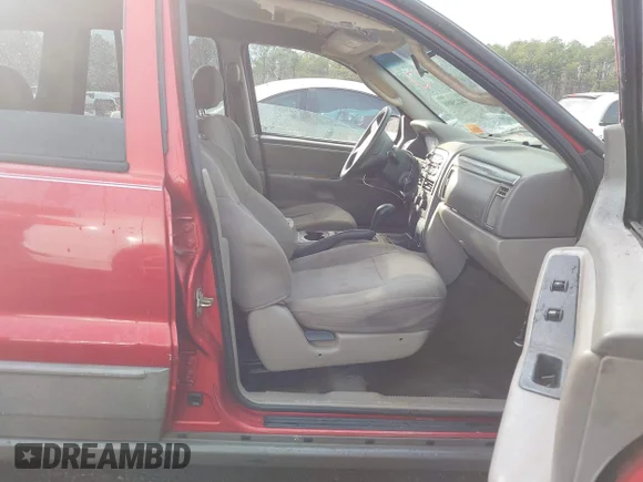 ✅ 2002 Jeep Grand Cherokee Laredo • VIN: 1J4GX48S02C301225 • Lot: 44125090. Wystawiony na IAAI z przebiegiem 304 620 mil. Bezpłatny archiwum sprzedaży aukcyjnych z USA i szczegółowy raport historii pojazdu na DreamBid. Zdjęcie 5.