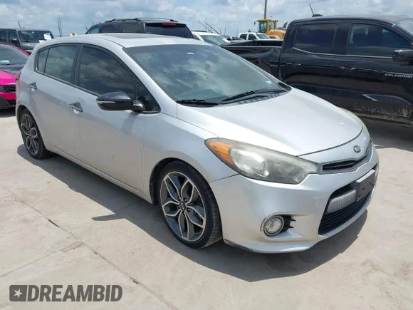 ✅ 2015 Kia Forte SX • VIN: KNAFZ5A3XF5269797 • Lot: 45262034. Listed on IAAI with 109,831 mi. Free auction sales archive from the USA and detailed vehicle history report at DreamBid. Image 1.