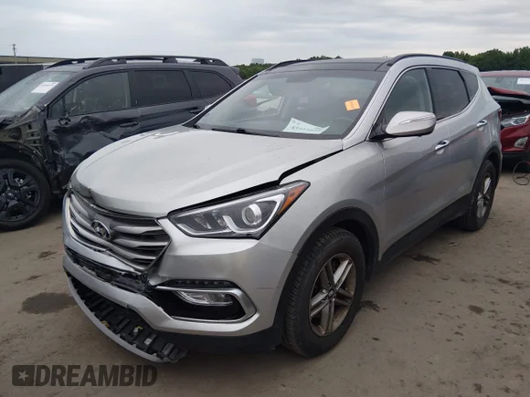 ✅ 2018 Hyundai Santa Fe 2.4L • VIN: 5XYZUDLBXJG541830 • Lot: 45451624. Wystawiony na IAAI z przebiegiem 93 759 mil. Bezpłatny archiwum sprzedaży aukcyjnych z USA i szczegółowy raport historii pojazdu na DreamBid. Zdjęcie 2.