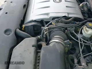 ✅ 2005 Cadillac DeVille • VIN: 1G6KD54YX5U258670 • Lot: 42942125. Listed on IAAI with 83,089 mi. Free auction sales archive from the USA and detailed vehicle history report at DreamBid. Image 13.