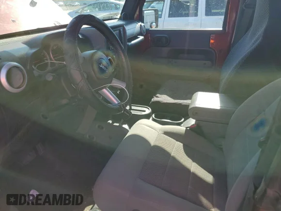 ✅ 2008 Jeep Wrangler Sahara • VIN: 1J4FA54158L566912 • Lot: 76498854. Wystawiony na Copart z przebiegiem 133 234 mil. Bezpłatny archiwum sprzedaży aukcyjnych z USA i szczegółowy raport historii pojazdu na DreamBid. Zdjęcie 7.