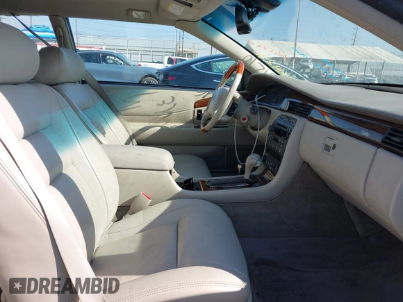 ✅ 2001 Cadillac Eldorado Touring ETC • VIN: 1G6ET12951B108847 • Лот: 44704296. Опубліковано раніше на IAAI з пробігом 71 652 миль. Безкоштовний доступ до архіву аукціонних продажів зі США та докладний звіт про історію автомобіля на DreamBid. Зображення 5.