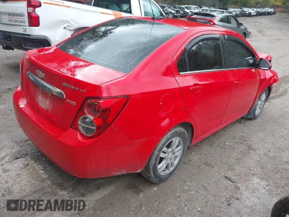 ✅ 2015 Chevrolet Sonic LT • VIN: 1G1JC5SB3F4125978 • Lot: 43318216. Listed on IAAI with Not provided. Free auction sales archive from the USA and detailed vehicle history report at DreamBid. Image 4.
