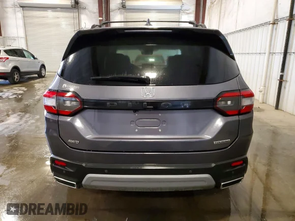 ✅ 2023 Honda Pilot Touring • VIN: 5FNYG1H72PB049671 • Lot: 56568276. Wystawiony na Copart z przebiegiem 41 333 mil. Bezpłatny archiwum sprzedaży aukcyjnych z USA i szczegółowy raport historii pojazdu na DreamBid. Zdjęcie 6.