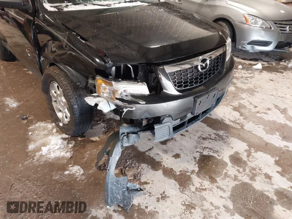 ✅ 2011 Mazda Tribute Touring • VIN: 4F2CY0C75BKM06748 • Лот: 43895589. Опубліковано раніше на IAAI з пробігом 85 505 миль. Безкоштовний доступ до архіву аукціонних продажів зі США та докладний звіт про історію автомобіля на DreamBid. Зображення 6.