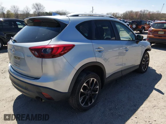 ✅ 2016 Mazda CX-5 Grand Touring • VIN: JM3KE4DY7G0604034 • Лот: 44794198. Опубликован ранее на IAAI с пробегом 161 672 миль. Бесплатный доступ к архиву аукционных продаж из США и подробный отчёт об истории автомобиля на DreamBid. Изображение 4.