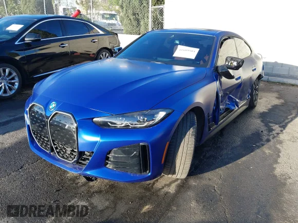 ✅ 2024 BMW i4 eDrive40 • VIN: WBY73AW07RFS43770 • Лот: 41689504. Опубліковано раніше на IAAI з пробігом 14 684 миль. Безкоштовний доступ до архіву аукціонних продажів зі США та докладний звіт про історію автомобіля на DreamBid. Зображення 2.