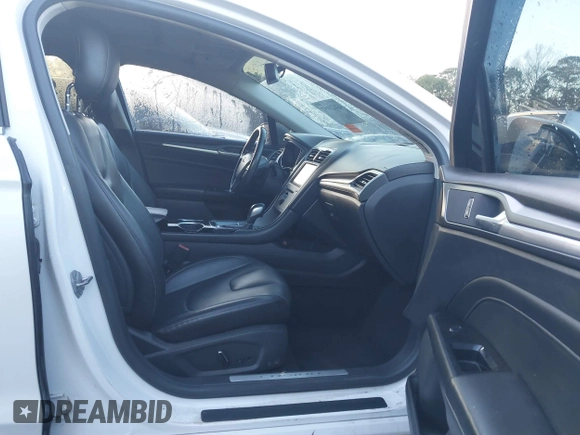 ✅ 2014 Ford Fusion Titanium • VIN: 3FA6P0K93ER125850 • Lot: 43820897. Wystawiony na IAAI z przebiegiem 234 008 mil. Bezpłatny archiwum sprzedaży aukcyjnych z USA i szczegółowy raport historii pojazdu na DreamBid. Zdjęcie 5.