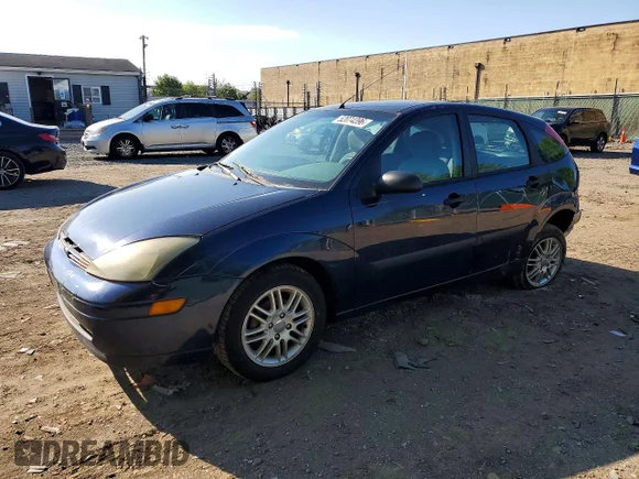 ✅ 2003 Ford Focus ZX5 • VIN: 3FAFP37333R123101 • Лот: 52074396. Опубліковано раніше на Copart з пробігом Не вказано. Безкоштовний доступ до архіву аукціонних продажів зі США та докладний звіт про історію автомобіля на DreamBid. Зображення 1.