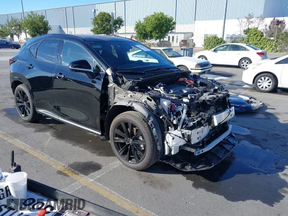 ✅ 2025 Lexus NX NX 450h+ F SPORT Handling • VIN: JTJKKCFZ4S2045294 • Lot: 42940405. Listed on IAAI with 6,911 mi. Free auction sales archive from the USA and detailed vehicle history report at DreamBid. Image 1.