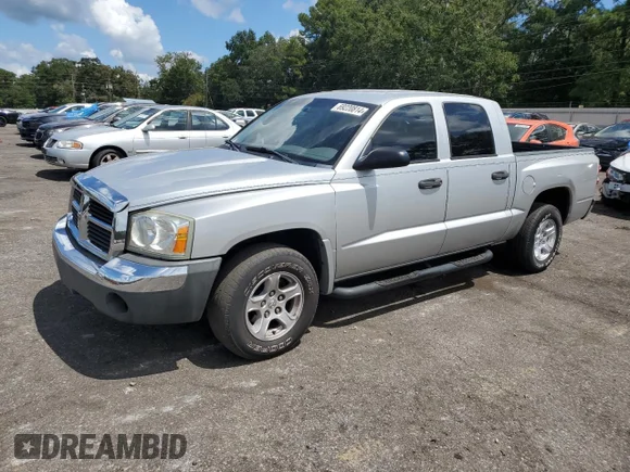 ✅ 2005 Dodge Dakota SLT • VIN: 1D7HE48K75S337445 • Лот: 69220814. Опубліковано раніше на Copart з пробігом 161 255 миль. Безкоштовний доступ до архіву аукціонних продажів зі США та докладний звіт про історію автомобіля на DreamBid. Зображення 1.