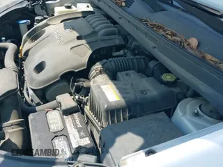 ✅ 2007 Kia Rondo EX • VIN: KNAFG526177111658 • Lot: 43035014. Listed on IAAI with 164,424 mi. Free auction sales archive from the USA and detailed vehicle history report at DreamBid. Image 12.