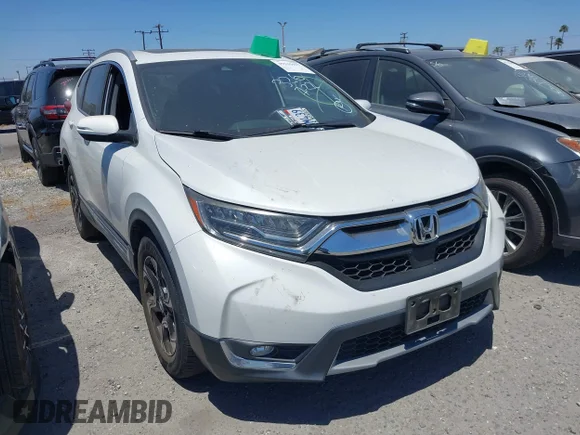 ✅ 2019 Honda CR-V Touring • VIN: 7FARW1H90KE017369 • Lot: 45535597. Wystawiony na IAAI z przebiegiem 43 035 mil. Bezpłatny archiwum sprzedaży aukcyjnych z USA i szczegółowy raport historii pojazdu na DreamBid. Zdjęcie 1.