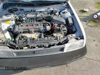 ✅ 1990 Toyota Corolla • VIN: JT2AE94A1L3375095 • Lot: 41892305. Wystawiony na Copart z przebiegiem 182 429 mil. Bezpłatny archiwum sprzedaży aukcyjnych z USA i szczegółowy raport historii pojazdu na DreamBid. Zdjęcie 13.