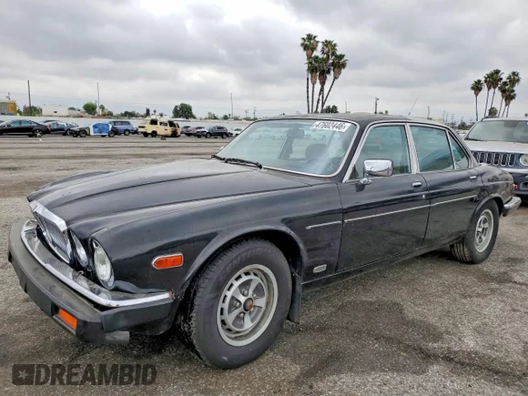 ✅ 1986 Jaguar XJ • VIN: SAJAY134XGC438696 • Lot: 47602446. Listed on Copart with 169,915 mi. Free auction sales archive from the USA and detailed vehicle history report at DreamBid. Image 1.