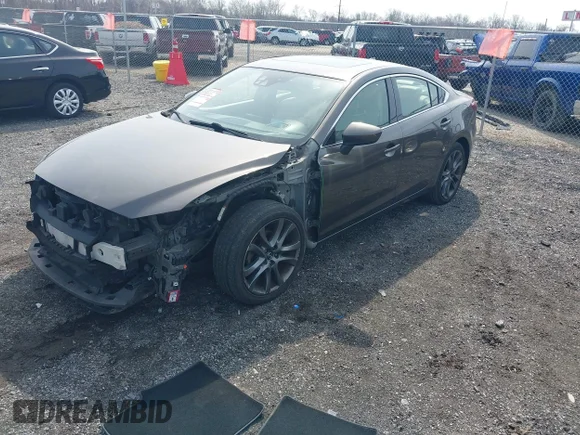 ✅ 2016 Mazda 6 i Grand Touring • VIN: JM1GJ1W53G1432350 • Lot: 44673525. Listed on IAAI with 157,765 mi. Free auction sales archive from the USA and detailed vehicle history report at DreamBid. Image 2.