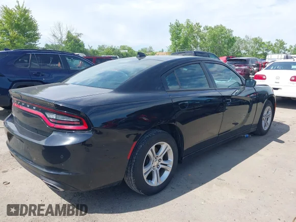 ✅ 2023 Dodge Charger SXT • VIN: 2C3CDXBGXPH575804 • Лот: 45194881. Опубліковано раніше на IAAI з пробігом 75 098 миль. Безкоштовний доступ до архіву аукціонних продажів зі США та докладний звіт про історію автомобіля на DreamBid. Зображення 4.