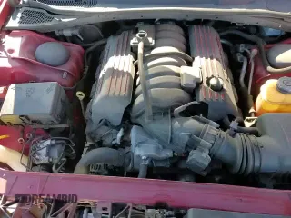 2016 Dodge Challenger 392 Hemi Scat Pack Shaker z VIN 2C3CDZFJ4GH300754, wystawiony jako Copart lot #85580684 z przebiegiem 89 473 mil mil oraz Szkoda całkowita • Salvage title. Historia ofert i sprzedaży dostępna na DreamBid. Obrazek 13.