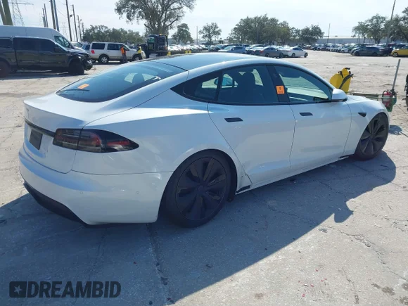 ✅ 2023 Tesla Model S • VIN: 5YJSA1E56PF501616 • Lot: 41291649. Listed on IAAI with Not provided. Free auction sales archive from the USA and detailed vehicle history report at DreamBid. Image 4.