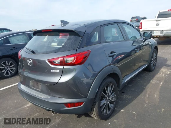 ✅ 2017 Mazda CX-3 Grand Touring • VIN: JM1DKDD70H0147196 • Lot: 43046639. Wystawiony na IAAI z przebiegiem 124 707 mil. Bezpłatny archiwum sprzedaży aukcyjnych z USA i szczegółowy raport historii pojazdu na DreamBid. Zdjęcie 4.