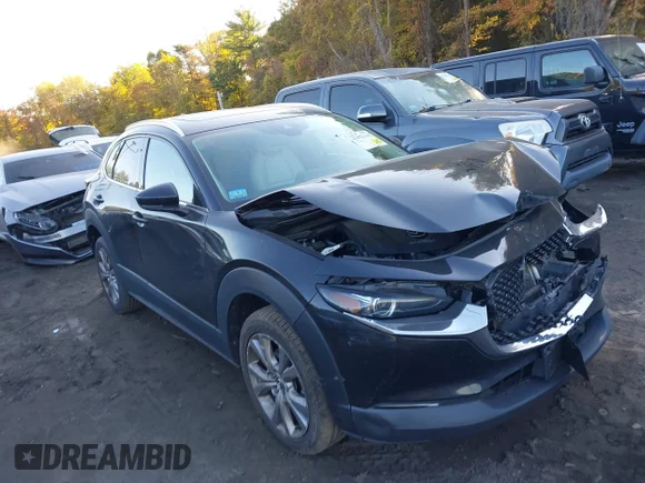 ✅ 2022 Mazda CX-30 S Premium • VIN: 3MVDMBDL9NM425788 • Лот: 43482444. Опубліковано раніше на IAAI з пробігом 92 069 миль. Безкоштовний доступ до архіву аукціонних продажів зі США та докладний звіт про історію автомобіля на DreamBid. Зображення 1.