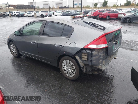 ✅ 2010 Honda Insight LX • VIN: JHMZE2H57AS036244 • Lot: 44020392. Listed on IAAI with 238,400 mi. Free auction sales archive from the USA and detailed vehicle history report at DreamBid. Image 3.