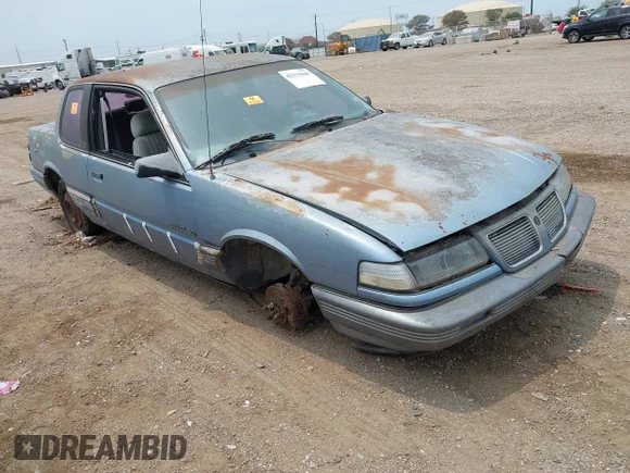 ✅ 1989 Pontiac Grand Am • VIN: 1G2NE14U8KC623740 • Lot: 42315044. Listed on IAAI with 149,143 mi. Free auction sales archive from the USA and detailed vehicle history report at DreamBid. Image 1.